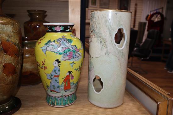 An Oriental yellow ground vase and a similar pierced sleeve vase tallest 28.5cm